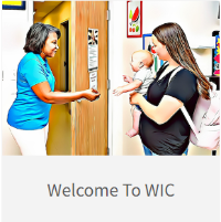 WIC Counsellor helping a parent holding her baby